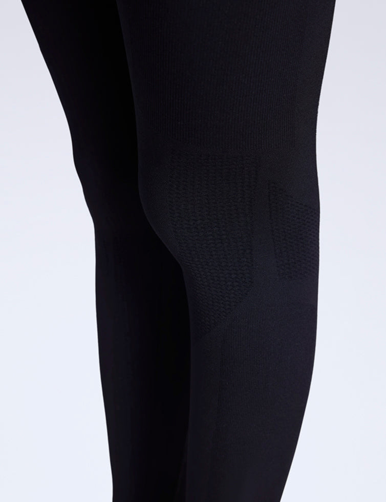 Black leggings on a white background
